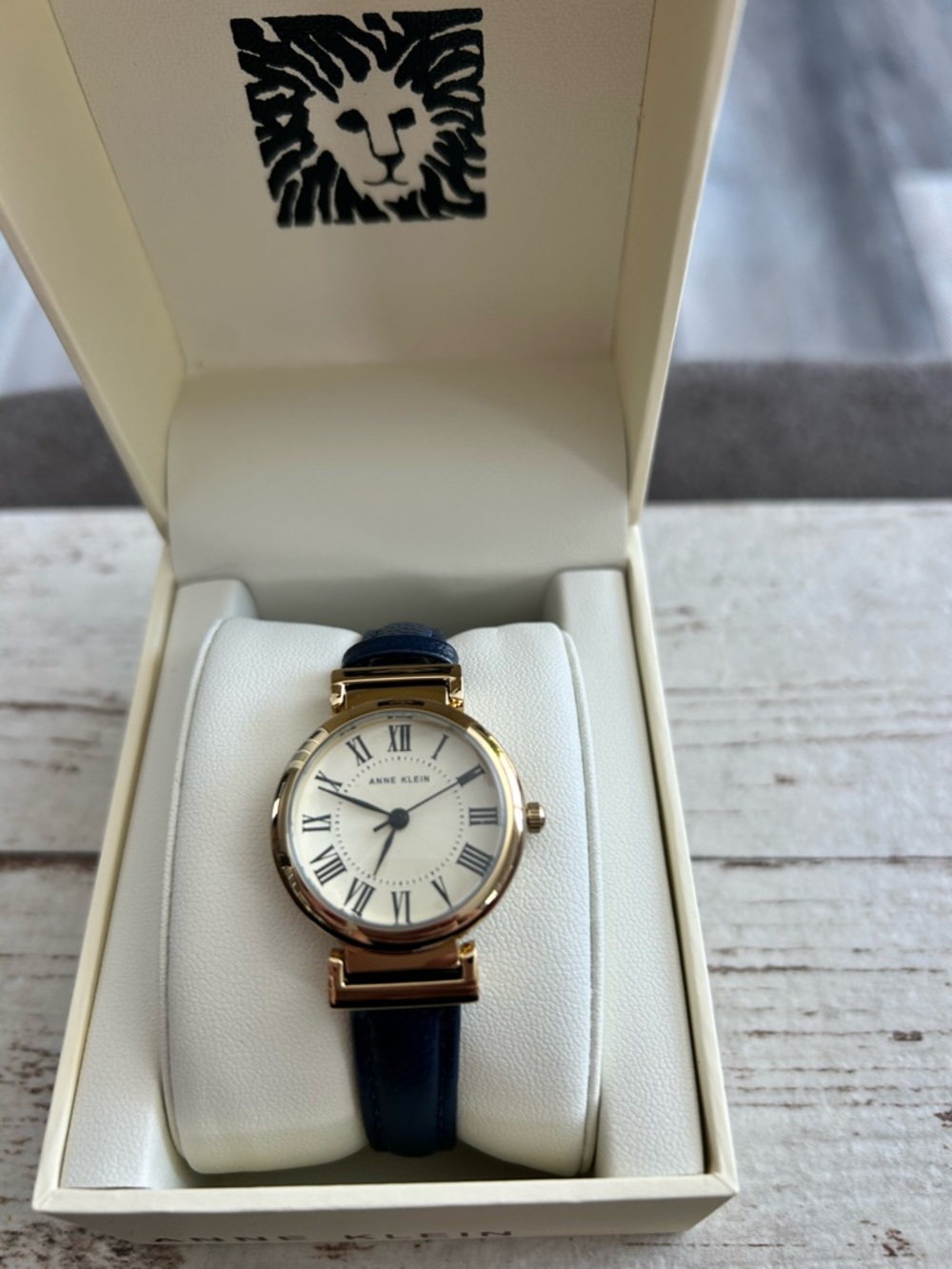 4/$100 Anne Klein Gold Case Watch with Navy Leather Strap